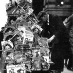 Pulps and a few “slicks” are clipped to the side of this magazine rack in New York City in November 1932. Pulps and a few “slicks” are clipped to the side of this magazine rack in New York City in November 1932.