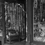 Pulp magazines hang upside down from a rack at a Manchester, N.H., shop in September 1937. Pulp magazines hang upside down from a rack at a Manchester, N.H., shop in September 1937.