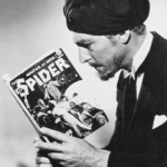 Actor Kenneth Duncan, dressed as Ram Singh from the 1938 film serial “The Spider’s Web,” poses with the October 1938 number of The Spider pulp in this publicity photo. Actor Kenneth Duncan, dressed as Ram Singh from the 1938 film serial “The Spider’s Web,” poses with the October 1938 number of The Spider pulp in this publicity photo.