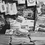 From January 1943, a newsstand on Fourth Avenue at 14th Street, New York, specializes in foreign newspapers, but also includes a few sports and detective pulps in the background. From January 1943, a newsstand on Fourth Avenue at 14th Street, New York, specializes in foreign newspapers, but also includes a few sports and detective pulps in the background.