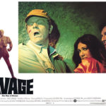 Renny (William Lucking) recoils from a strike by a vaporous viper as Monja (Pamela Hensley) and Ham (Darrell Zwerling) look on in George Pal’s 1975 film, Doc Savage: The Man of Bronze.
